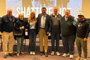 Panelists and hosts gathered after a Shattered Ice screening