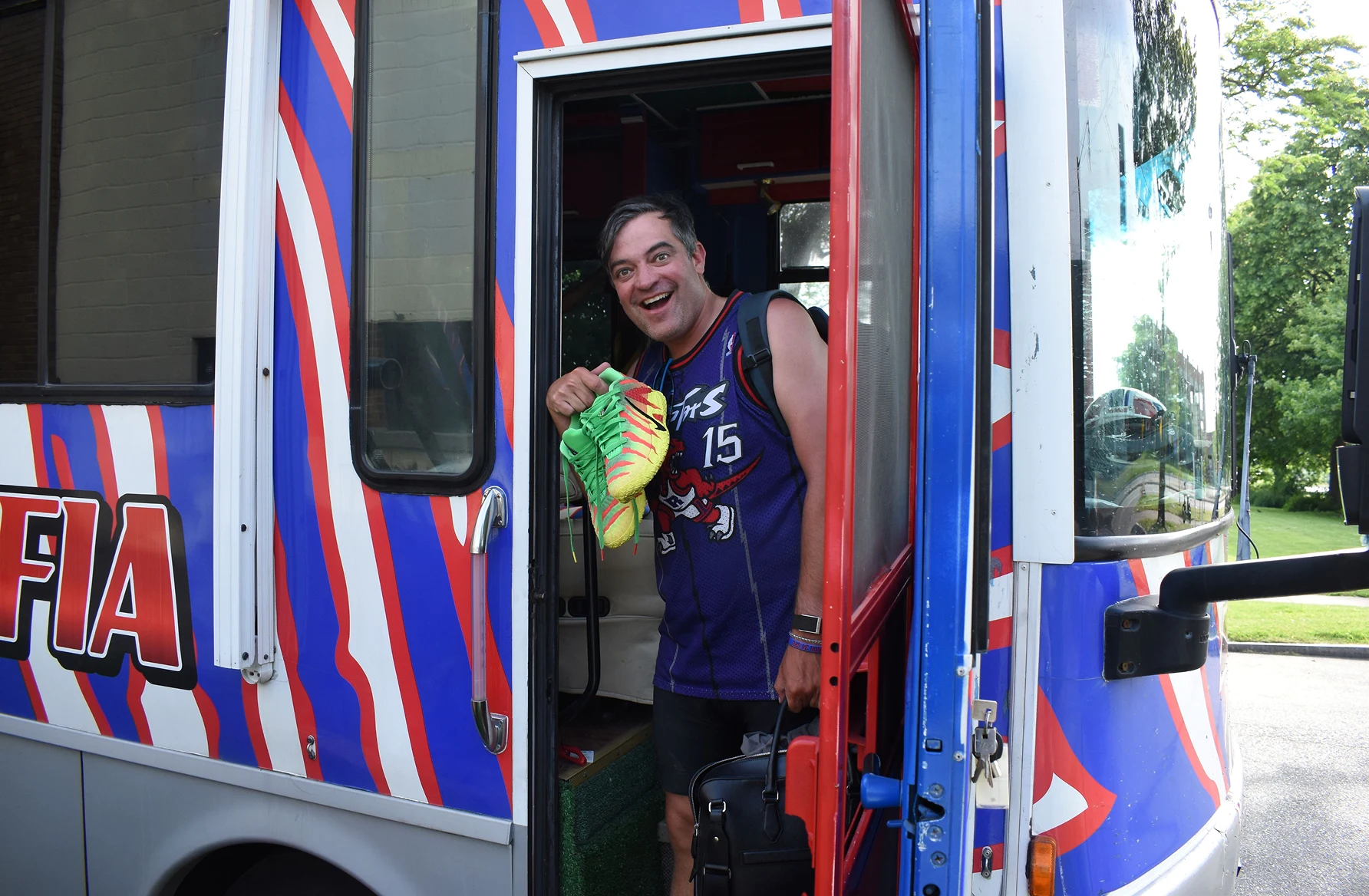Rory Camardello arriving at the celebration in Rochester with his Raptor Rides bus