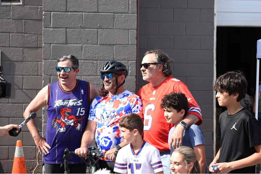 Riders and supporters gathered to welcome Rory at the end of the route